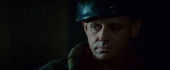 Movie still from “Blade Runner” (1982), directed by Ridley Scott – A person wearing a hat; Close Up shot, Over the shoulder angle