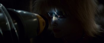 Movie still from “Blade Runner” (1982), directed by Ridley Scott – A person with a hair dryer in their face; Extreme Close Up shot, Over the shoulder angle