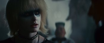 Movie still from “Blade Runner” (1982), directed by Ridley Scott – A woman's face in a mirror; Close Up shot, Over the shoulder angle