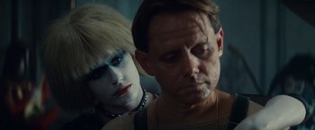 Movie still from “Blade Runner” (1982), directed by Ridley Scott – A man and a woman are looking at each other; Close Up shot, Over the shoulder angle