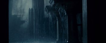 Movie still from “Blade Runner” (1982), directed by Ridley Scott – A view of a fountain in a dark room; Wide shot, Low angle