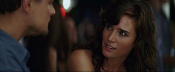 Movie still from “Blood Diamond” (2006), directed by Edward Zwick – A person with long dark hair; Close Up shot, Over the shoulder angle