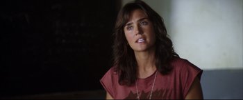 Movie still from “Blood Diamond” (2006), directed by Edward Zwick – A person with long brown hair; Close Up shot, Over the shoulder angle