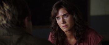 Movie still from “Blood Diamond” (2006), directed by Edward Zwick – A person with long brown hair; Close Up shot, Over the shoulder angle