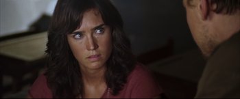 Movie still from “Blood Diamond” (2006), directed by Edward Zwick – A person looking at the camera; Close Up shot, Over the shoulder angle