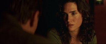 Movie still from “Blood Diamond” (2006), directed by Edward Zwick – A person looking at a mirror; Close Up shot, Over the shoulder angle