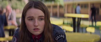 Movie still from “Booksmart” (2019), directed by Olivia Wilde – A person with long hair; Close Up shot, Over the shoulder angle