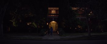 Movie still from “Booksmart” (2019), directed by Olivia Wilde – Two people walking down a sidewalk at night; Extreme Wide shot, Low angle