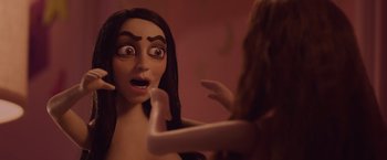 Movie still from “Booksmart” (2019), directed by Olivia Wilde – A woman looking in the mirror with her hand on her face; Close Up shot, Over the shoulder angle