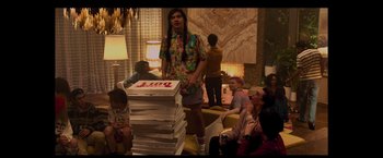 Movie still from “Booksmart” (2019), directed by Olivia Wilde – A group of people sitting in a living room; Wide shot, Over the shoulder angle