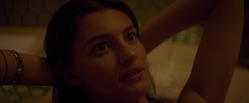 Movie still from “Booksmart” (2019), directed by Olivia Wilde – A woman's face in the dark; Close Up shot, Low angle