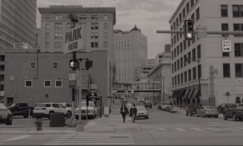 Movie still from “C'mon C'mon” (2021), directed by Mike Mills – A black and white photo of a city street; Extreme Wide shot, Low angle