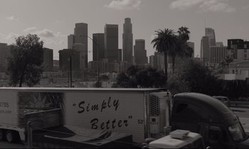 Movie still from “C'mon C'mon” (2021), directed by Mike Mills – A black and white photo of a city skyline; Extreme Wide shot, High angle
