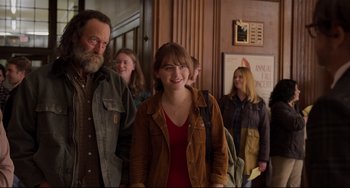 Movie still from “CODA” (2021), directed by Sian Heder – A group of people standing in front of a building; Medium shot, Over the shoulder angle