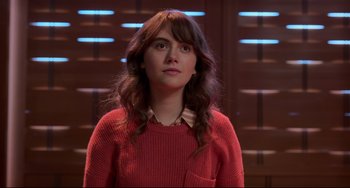 Movie still from “CODA” (2021), directed by Sian Heder – A woman in a red sweater is looking at the camera; Close Up shot, Over the shoulder angle