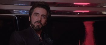 Movie still from “Carlito's Way” (1993), directed by Brian De Palma – A person with a beard; Close Up shot, Low angle