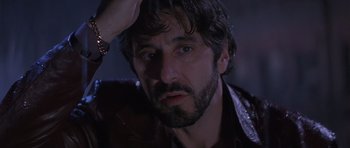 Movie still from “Carlito's Way” (1993), directed by Brian De Palma – A person wearing a jacket; Close Up shot, Low angle