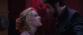 Movie still from “Carlito's Way” (1993), directed by Brian De Palma – A man and a woman looking at one another; Close Up shot, Over the shoulder angle