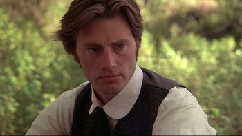 Movie still from “Days of Heaven” (1978), directed by Terrence Malick – A person with long hair; Close Up shot, Over the shoulder angle