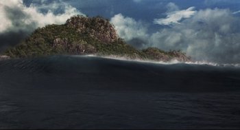 Movie still from “Cast Away” (2000), directed by Robert Zemeckis – A large body of water near a mountain range; Extreme Wide shot, High angle