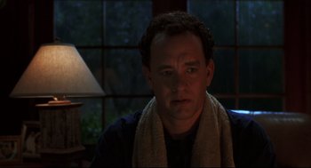 Movie still from “Cast Away” (2000), directed by Robert Zemeckis – A man with a towel around his neck; Close Up shot, Low angle