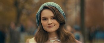 Movie still from “Cherry” (2021), directed by Joe Russo – A person wearing a hat; Close Up shot, Over the shoulder angle