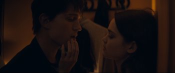 Movie still from “Cherry” (2021), directed by Joe Russo – A man and a woman looking at one another; Close Up shot, Over the shoulder angle