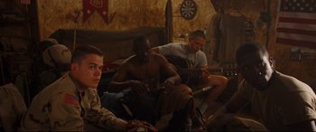 Movie still from “Cherry” (2021), directed by Joe Russo – Medium shot, High angle