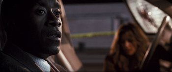 Movie still from “Crash” (2004), directed by Paul Haggis – A man's face in front of a mirror; Close Up shot, Over the shoulder angle