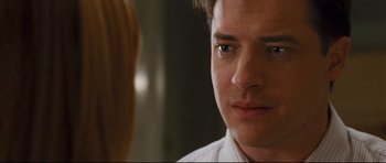 Movie still from “Crash” (2004), directed by Paul Haggis – A person looking at the camera; Close Up shot, Over the shoulder angle