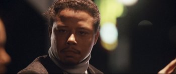 Movie still from “Crash” (2004), directed by Paul Haggis – A person wearing a jacket; Close Up shot, Low angle