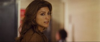 Movie still from “Crash” (2004), directed by Paul Haggis – A person with long hair; Close Up shot, Over the shoulder angle