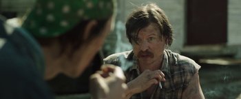 Movie still from “Dallas Buyers Club” (2013), directed by Jean-Marc Vallée – A man smoking a cigarette in front of a mirror; Close Up shot, Over the shoulder angle