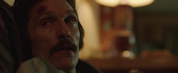 Movie still from “Dallas Buyers Club” (2013), directed by Jean-Marc Vallée – A person with a mustache; Close Up shot, Low angle