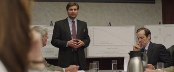 Movie still from “Dallas Buyers Club” (2013), directed by Jean-Marc Vallée – A man standing in front of a group of people; Medium shot, Over the shoulder angle