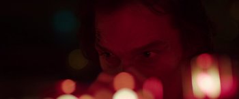 Movie still from “Dallas Buyers Club” (2013), directed by Jean-Marc Vallée – A person's face with lights in the background; Extreme Close Up shot, Low angle