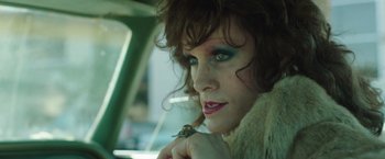 Movie still from “Dallas Buyers Club” (2013), directed by Jean-Marc Vallée – A woman with a bird in her hand; Close Up shot, High angle