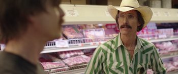 Movie still from “Dallas Buyers Club” (2013), directed by Jean-Marc Vallée – A man wearing a cowboy hat in front of a meat counter; Close Up shot, Over the shoulder angle