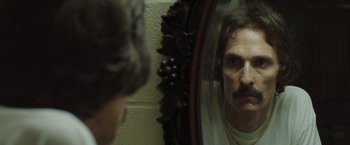 Movie still from “Dallas Buyers Club” (2013), directed by Jean-Marc Vallée – A man looking at himself in a mirror; Close Up shot, Over the shoulder angle