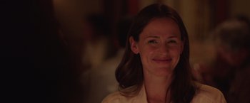 Movie still from “Dallas Buyers Club” (2013), directed by Jean-Marc Vallée – A person smiling for the camera; Close Up shot, Over the shoulder angle