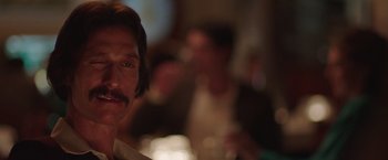 Movie still from “Dallas Buyers Club” (2013), directed by Jean-Marc Vallée – A person with a mustache; Close Up shot, Over the shoulder angle