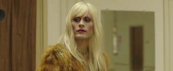 Movie still from “Dallas Buyers Club” (2013), directed by Jean-Marc Vallée – A woman with long blonde hair wearing a fur coat; Close Up shot, Over the shoulder angle