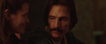 Movie still from “Dallas Buyers Club” (2013), directed by Jean-Marc Vallée – A person with a mustache; Close Up shot, Over the shoulder angle
