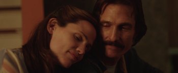 Movie still from “Dallas Buyers Club” (2013), directed by Jean-Marc Vallée – A man and a woman laying next to each other; Close Up shot, Low angle