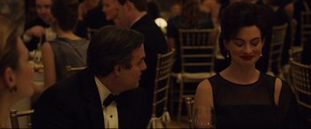 Movie still from “Dark Waters” (2019), directed by Todd Haynes – A man and a woman are sitting at a table together; Medium shot, Over the shoulder angle