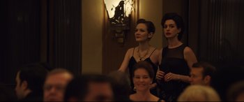 Movie still from “Dark Waters” (2019), directed by Todd Haynes – A group of women standing next to each other in a room; Medium shot, Over the shoulder angle