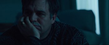 Movie still from “Dark Waters” (2019), directed by Todd Haynes – A person with his hand under his chin; Close Up shot, Low angle