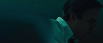 Movie still from “Dark Waters” (2019), directed by Todd Haynes – A man in a white dress shirt and a tie; Close Up shot, Over the shoulder angle