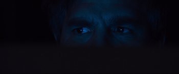 Movie still from “Dark Waters” (2019), directed by Todd Haynes – A man's eyes in the dark; Extreme Close Up shot, Overhead angle