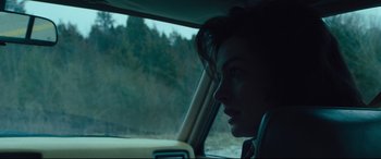 Movie still from “Dark Waters” (2019), directed by Todd Haynes – A man sitting in a car looking out the window; Close Up shot, Over the shoulder angle